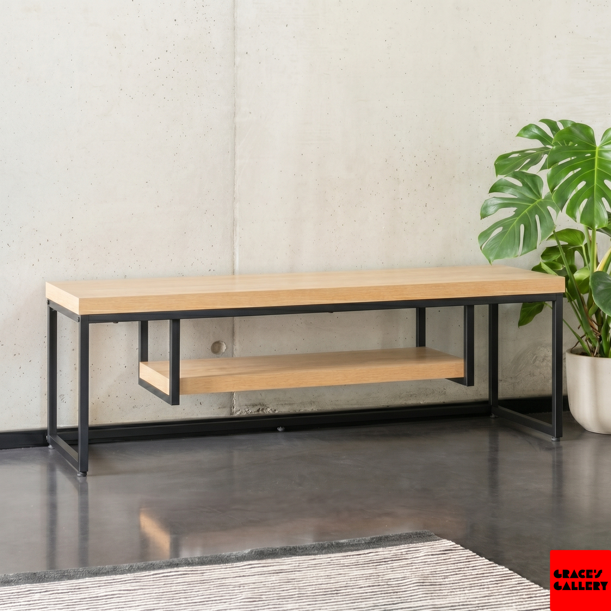 Minimalist pine and black steel media console with a floating lower shelf